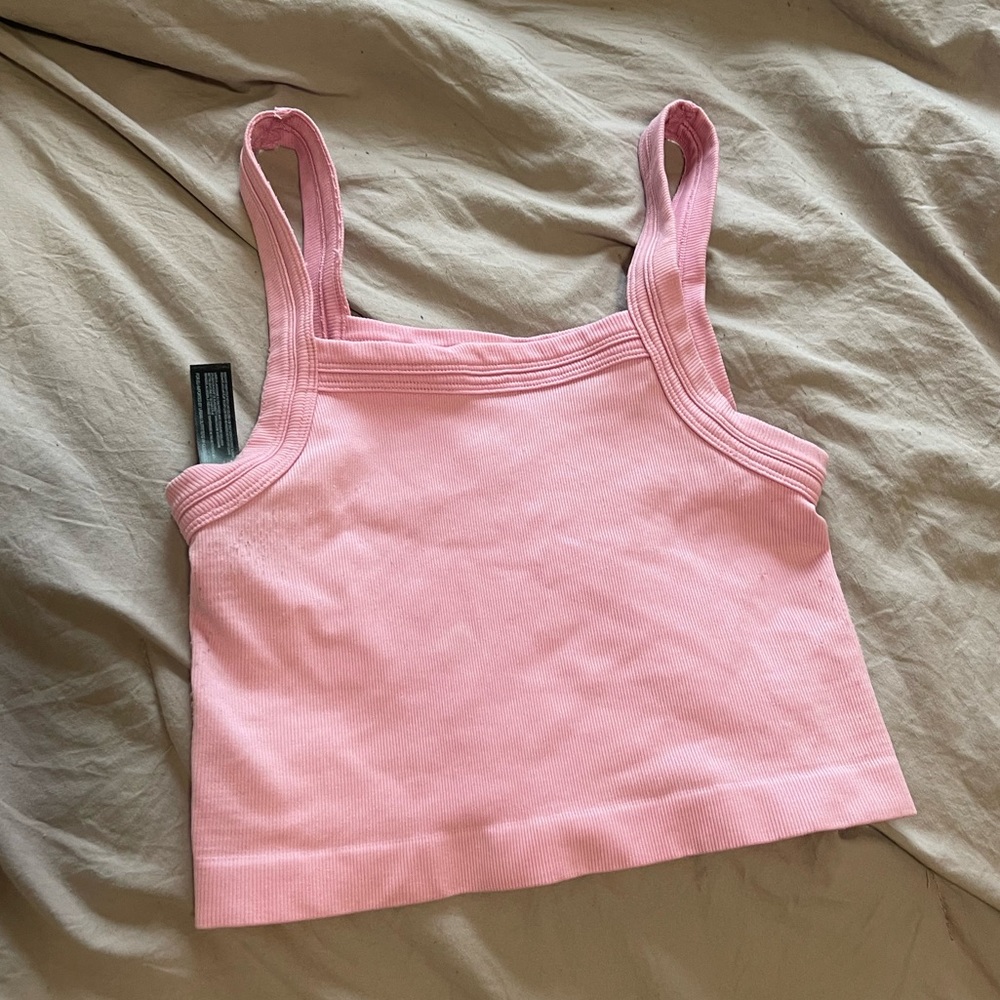 Out from under urban outfitters tank